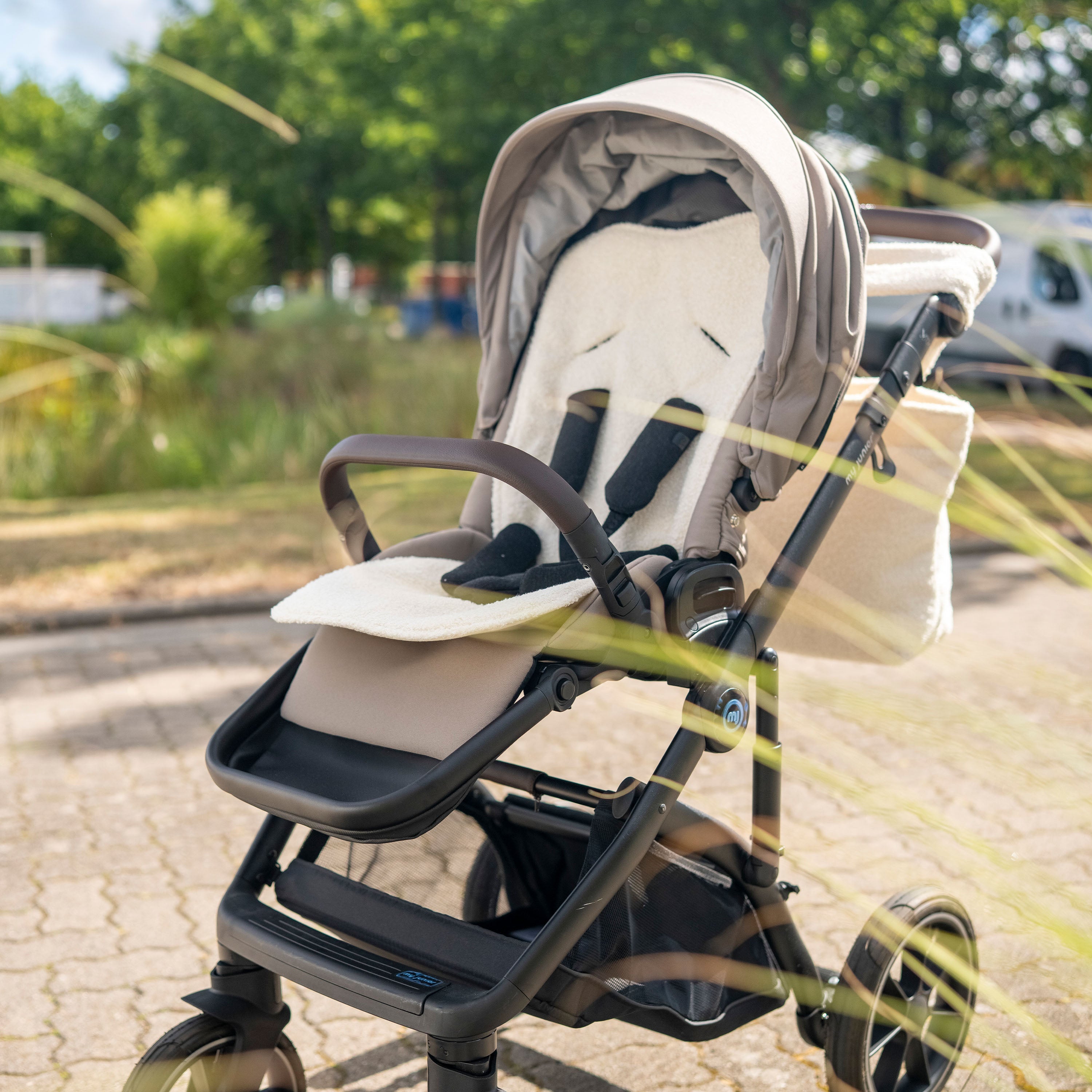 Sitzauflage Teddystoff Boucle für den Kinderwagen - universell passend