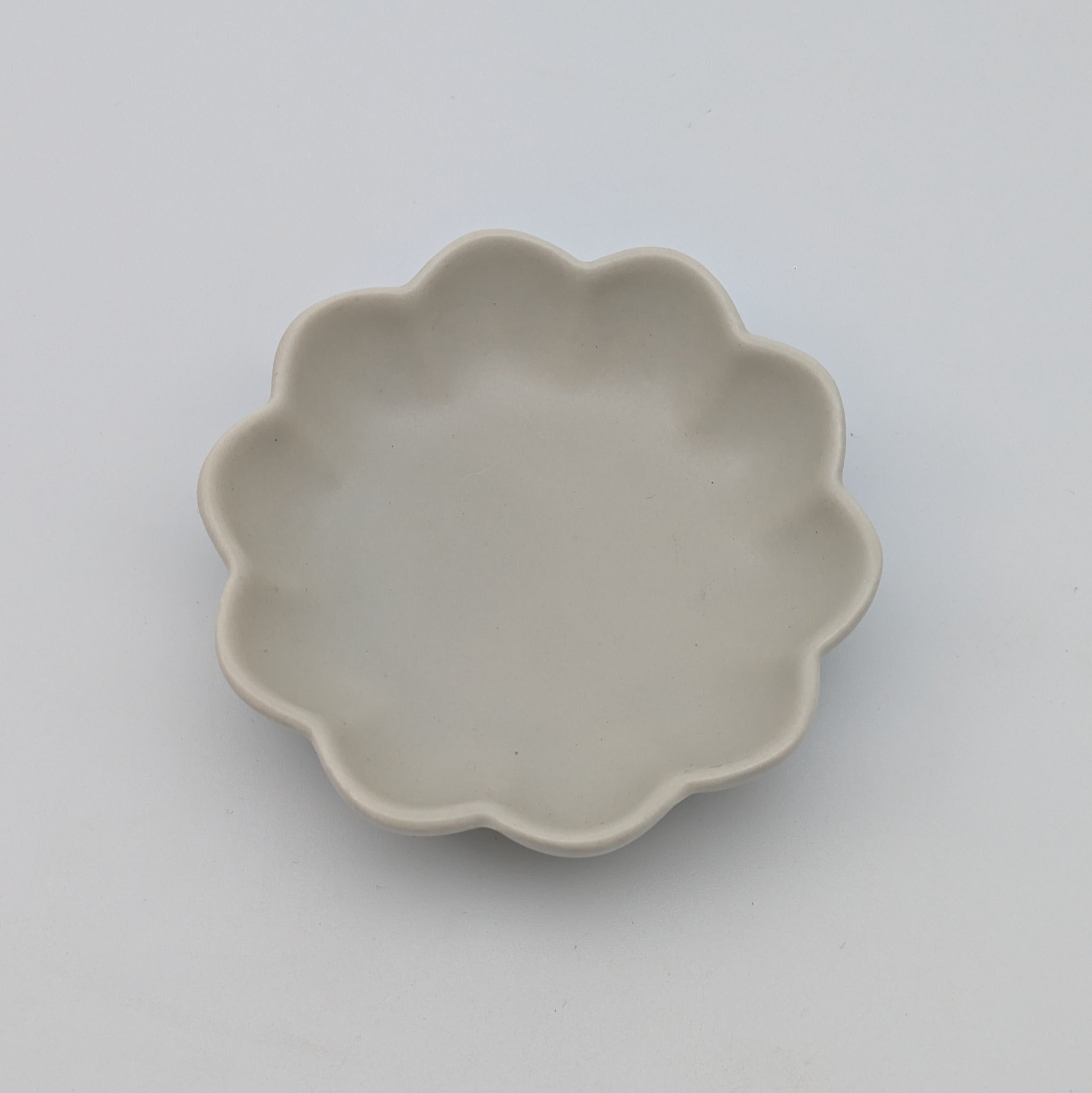 Untersetzer Blüte beige